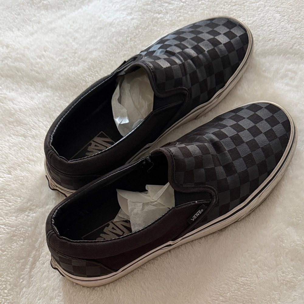 Vans Black and Gray Checkered Slip-On Sneakers (men’s size 8.5; women’s size 10)